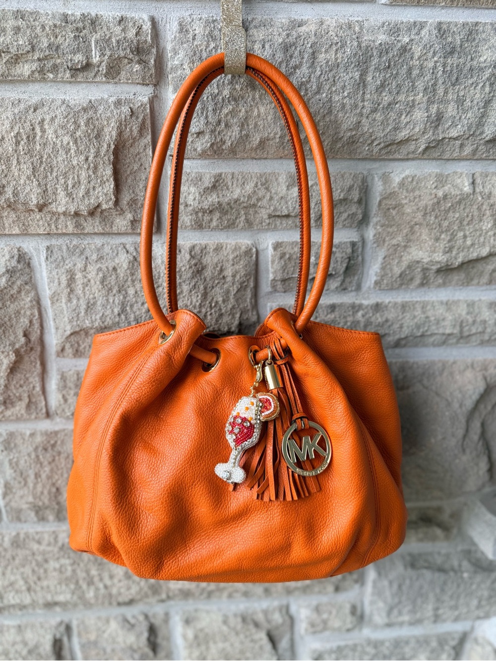 Michael Kors Orange Pebbled Leather Slouchy Drawstring Shoulder Tote
